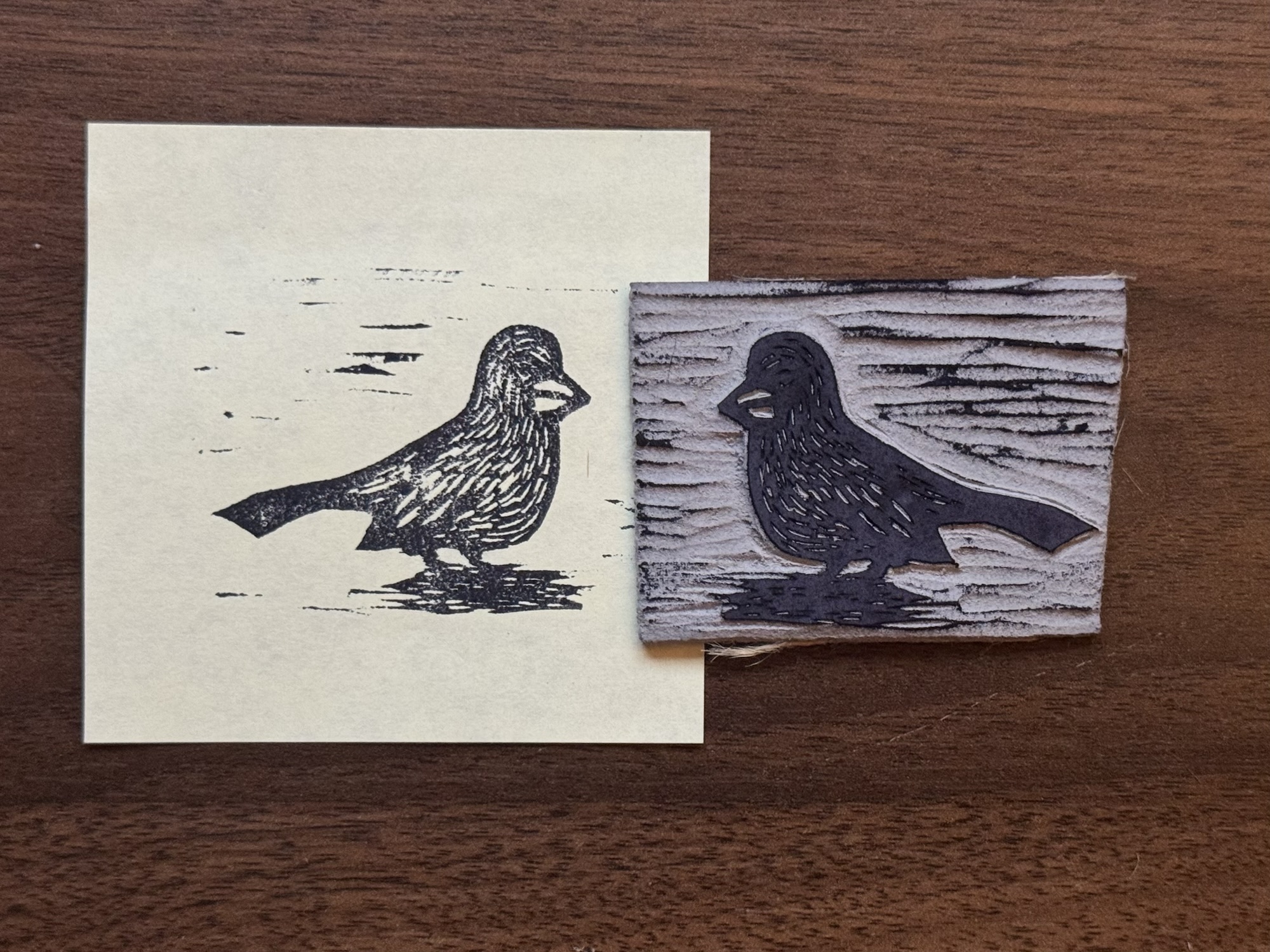 A stamp and its print of an Abert’s towhee.